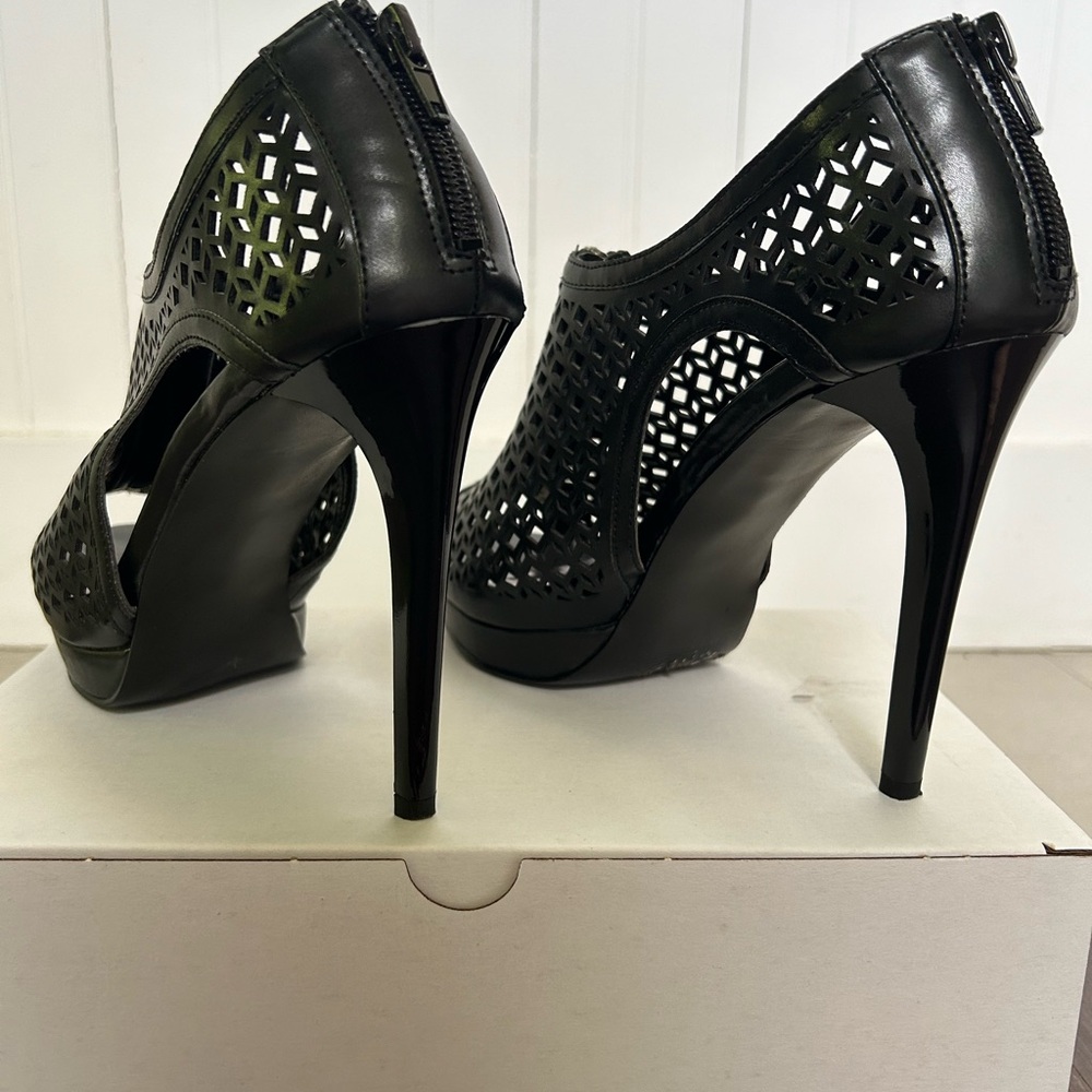 Carlos Santana black platforms
